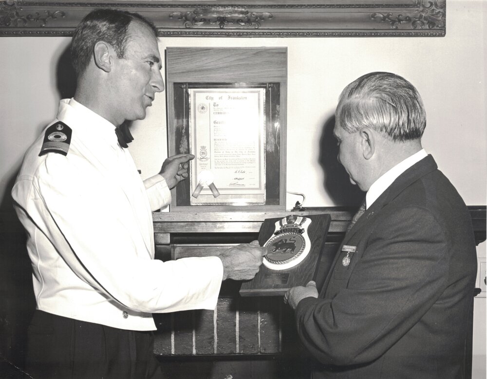 Cr. Noel Oates, Mayor 1971-72, receiving plaque at Centenary of Local Government in Frankston celebration