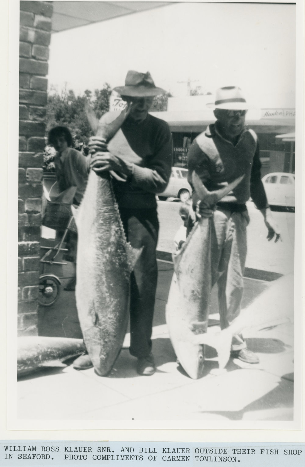 William Ross Klauer Snr. and Bill Klauer outside their fish shop in Seaford, circa 1950 
