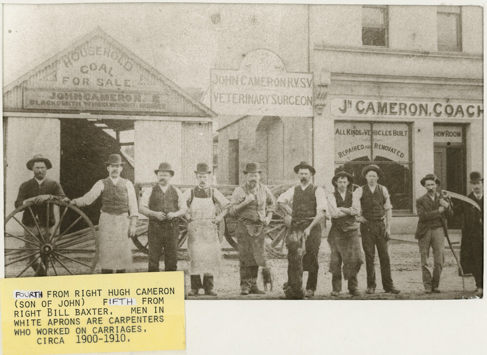 Hugh Cameron, Bill Baxter and others in front J. Cameron Coach Builder premises 