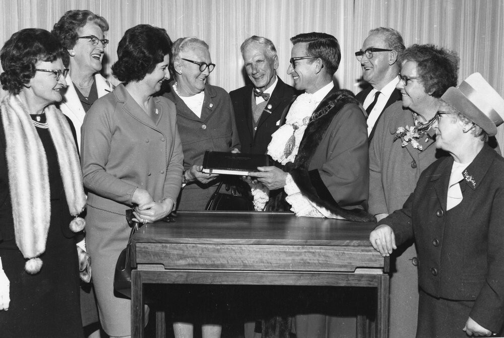 Presentation of City of Frankston Visitors Book to Mayor Cr. P.G. Hosking. This was donated by the combined Pensioners’ Association – Frankston Branch. 